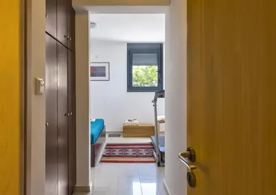 a hallway with a door leading to a room at Villa Lefki in Vamos