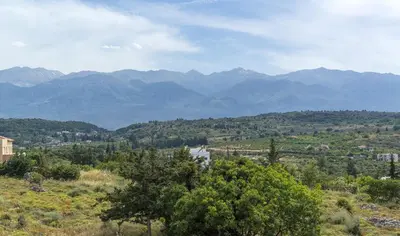 a view of a valley with a river and mountains at Villa Lefki in Vamos