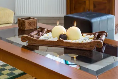 a table with candles on top of a table at Villa Marianna in Vryses