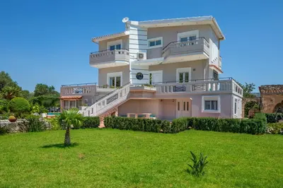 a large house with a lawn in front of it at Villa Marianna in Vryses