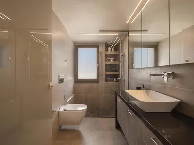 a bathroom with a sink and a toilet and a mirror at Villa Agali I 