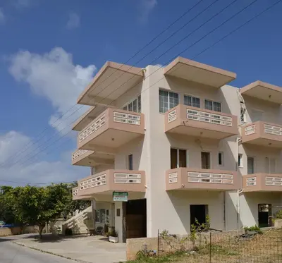 a building with balconies on the side of it at Niriida in Sfinárion