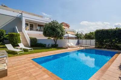 a swimming pool in the backyard of a house at Villa Katerina with Private Pool in Chania Town