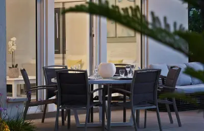 a table and chairs sitting on a patio at Villa Elvina in Kissamos