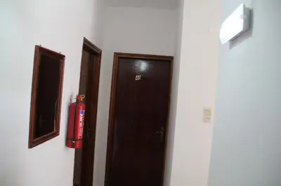 a room with a fire hydrant next to a door at Hotel Stavris in Khóra Sfakíon