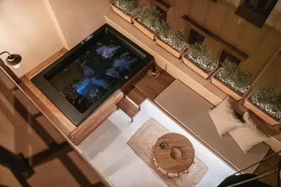 an overhead view of a bathroom with a large tub at Casa Athanasia in Chania Town