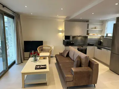 a living room with a couch and a table at Mitos Villas in Gerani Chanion