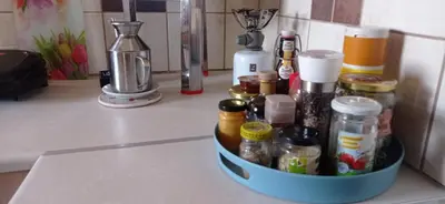a container on a counter with many bottles on it at Spacious Sunny house in Chania in Chania Town