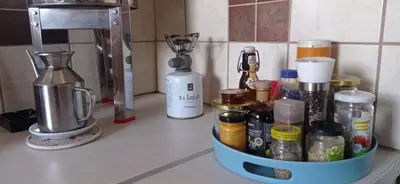 a container on a counter with spices and a blender at Spacious Sunny house in Chania in Chania Town