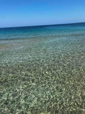 a large body of water with rocks and reefs at Beautiful house in the old town of Chania- 4 rooms in Chania Town