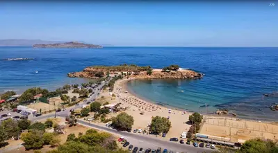 an aerial view of a beach with a group of people at Villa Ammos in Daratso