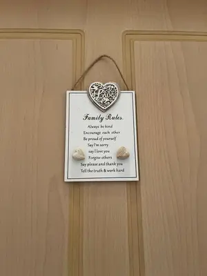 a sign on a door with a heart on it at Jomaa luxury residence in Chania Town
