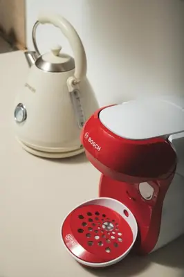 a red blender and a tea kettle on a counter at ModernPastel Studio-Near Old Port in Chania Town