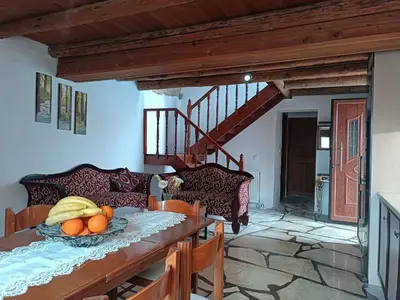 a dining room with a table with a bowl of fruit at Villa Lina private pool in Kondomari