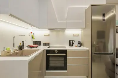 a kitchen with a sink and a stove top oven at Nicole Studio in Center Chania in Chania Town