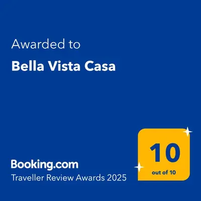 a yellow sign with the text awarded to bellia vista casas at Bella Vista Casa in Chania Town