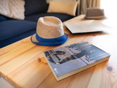 a hat sitting on top of a table at Olive Grove Apartment in Chania Town