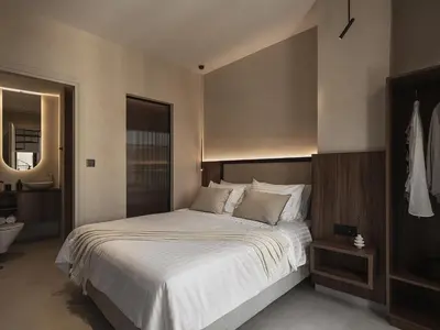 a bedroom with a large bed and a bathroom at Copal Simple Staying in Chania Town
