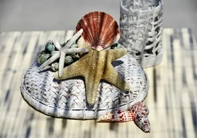 a figurine of a shell and starfish on a table at Andy's Gardens in Gerani Chanion
