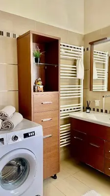 a washing machine in a bathroom with a sink at Sea View Apartment #1 in Ayiá