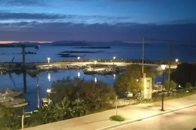 a view of a marina at night at Ferienwohnung am Meer Belle Vue in Chania Town