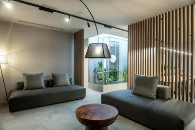 a living room with two couches and a table at Zakro Luxury Living Chania in Chania Town