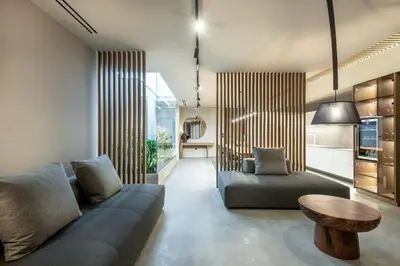 a living room with a couch and a table at Zakro Luxury Living Chania in Chania Town