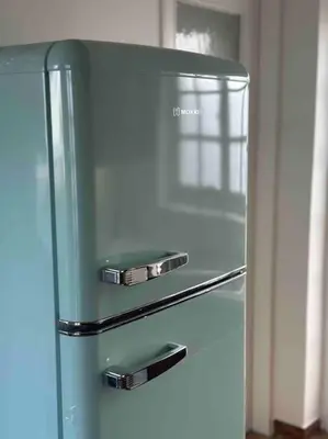 a refrigerator with a glass door in a kitchen at Linear Flat - City Center - Private Parking in Chania Town