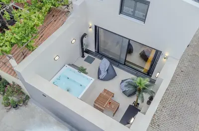 an overhead view of a swimming pool on a building at MOS Luxury Suits 