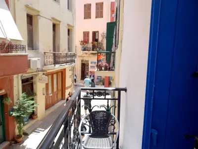 a view of an alley from a balcony at Villa Archondisa in Chania Town