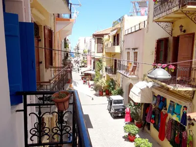 a view of a street from a balcony at Villa Archondisa in Chania Town