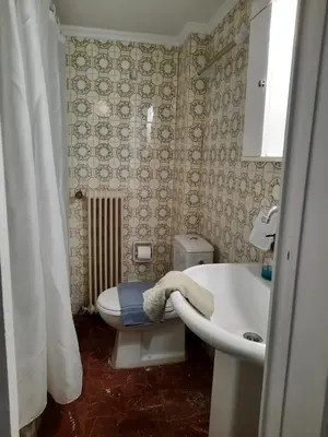 a bathroom with a toilet and a sink at Apartment Chania - Nea Chora in Chania Town