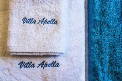 a close up of two towels with the words mulilla repedia at VILLA APELLA - PRIVATE HEATED POOL in Nohia