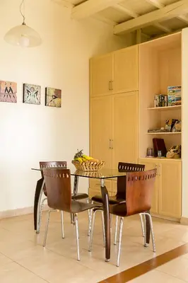 a dining room with a table and chairs at Seaview villa Amphitriti with Private Pool, 20 min from Elafonissi beach in Chania Town