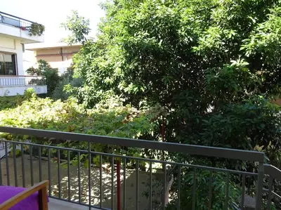 a metal fence in front of a tree at House of joy close to Chania center in Chania Town