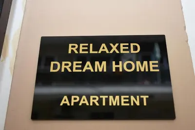 a sign that reads relaxed dream home apartment at Relaxed Dream home in Chania Town
