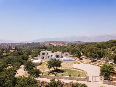 an aerial view of a villa in the hills at Villa Annie Crete - Private Luxury Villa with Sea and Mountain Views in Tsivarás