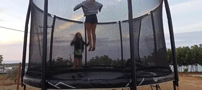 two people standing on top of a trampoline at Casa Lazareta in Chania Town