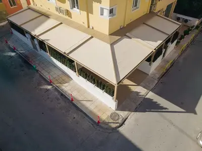 an overhead view of a building with white awnings at Nobel apartment, Chania Town in Chania Town