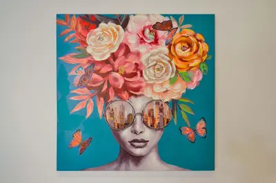 a painting of a woman with flowers and sunglasses at Alex Downtown Holiday Apartment in Chania Town