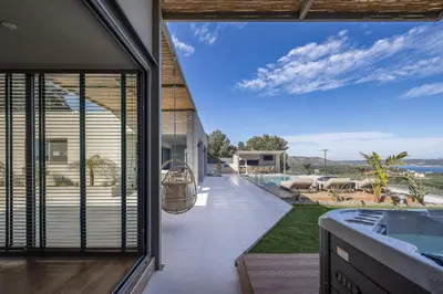 a house with a view of the yard at Virtus in Mare in Tsivarás