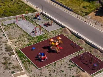 an overhead view of a park with a playground at BABIS & POPI APARTMENTS in Frangokastello