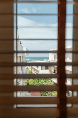 a view of the ocean from a window at El Chacha Studio in Galatás