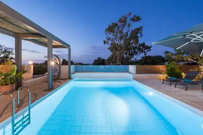 an image of a swimming pool in a house at Natura Hill Villa I Sea View in Kounoupidhianá