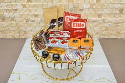 a basket filled with food and snacks on a counter at La Fleur in Chania Town