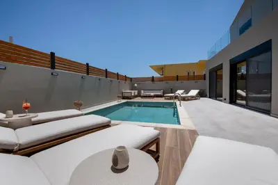 a swimming pool on the roof of a building at Tersus Luxury Villa in Kalyves