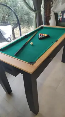 a pool table with a green cloth and balls on it at Drop of Heaven in Katokhórion