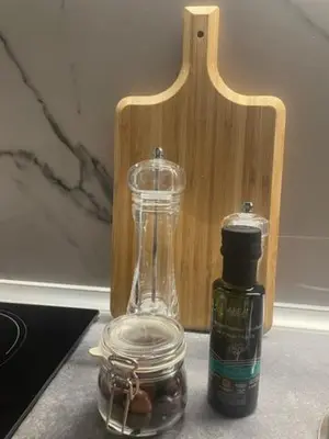 a glass blender and a bottle on a counter at Steki Luxury Room 2 in Chania Town