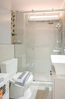 a bathroom with a shower and a toilet and a sink at Petra's Charming Home, 500m to Beach in Chania Town