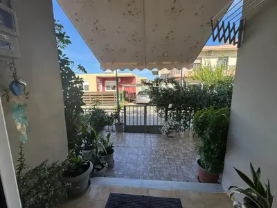 a view from the hallway of a house with plants at Myhope in Chania Town